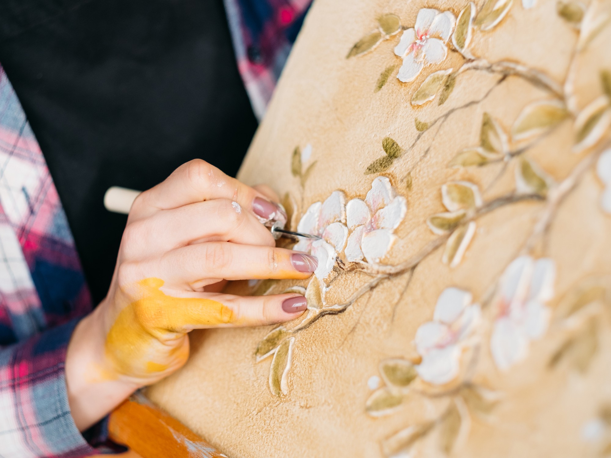 large embroidered textile with floral motif